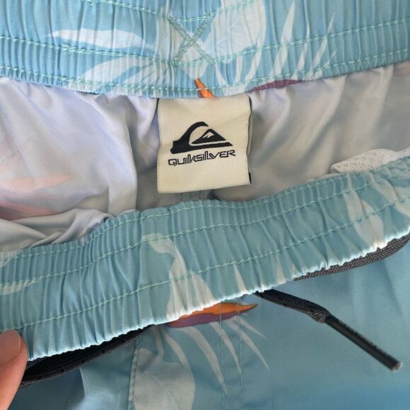 Quiksilver Blue and Orange Swim Trunks with Tropical Floral Design - Picture 5 of 7